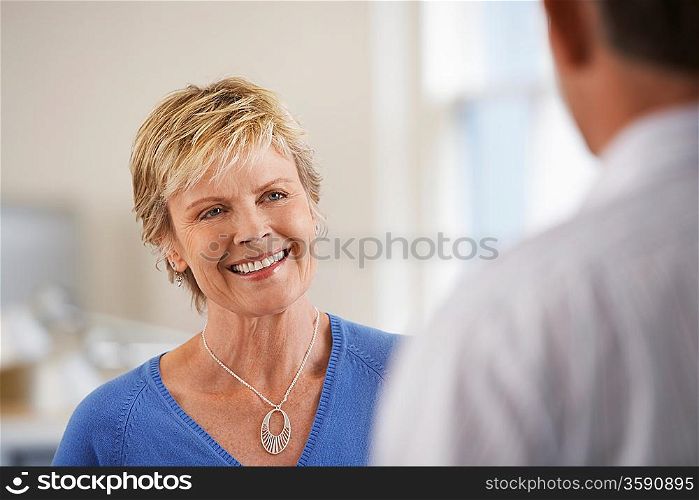 Smiling Woman in Office