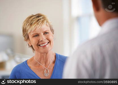 Smiling Woman in Office