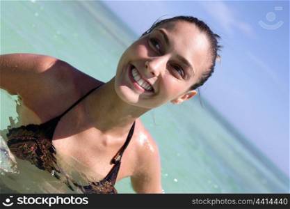 Smiling woman in the sea