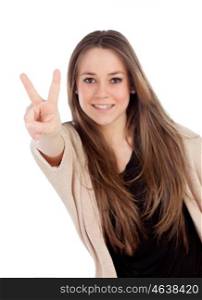 Smiling woman making the sign of victory isolated on a white background. With focus on hand