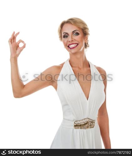 Smiling woman showing ok sign. Isolated on white background