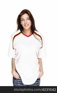 smiling woman wearing football shirt with hands in her pockets. smiling woman wearing football shirt with hands in her pockets on white background