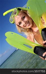 Smiling woman wearing snorkeling outfit