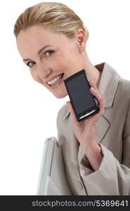 Smiling woman with a mobile phone