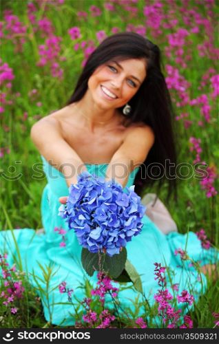 Smiling woman with flowers