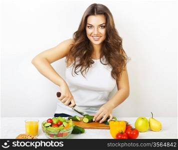 smiling woman with knife on kitchen