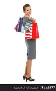 Smiling woman with shopping bags
