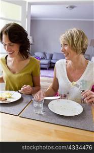 Smiling women having lunch together