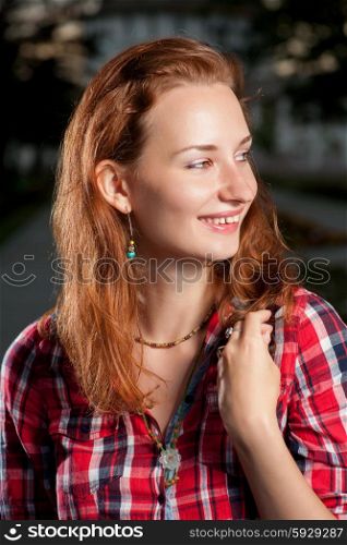 Smiling women with long ginger hair