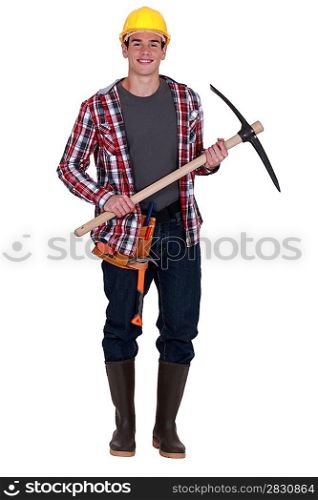 Smiling workman with pickaxe