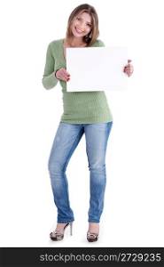 Smiling young beautiful woman holding blank white board over white background