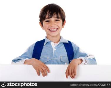 Smiling young boy behind the blank board on isolated white background