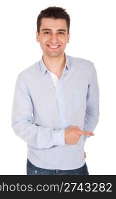 smiling young casual man pointing at something (isolated on white background)