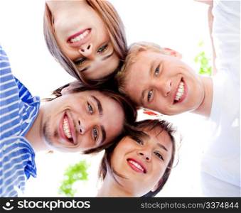 Smiling young couples with clear sky in the background