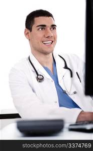 Smiling young doctor at his office over white background