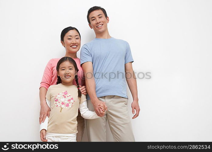 Smiling Young Family