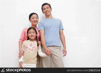 Smiling Young Family