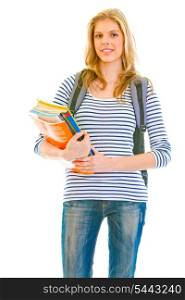 Smiling young girl with schoolbag holding schoolbooks in hands isolated on white &#xA;