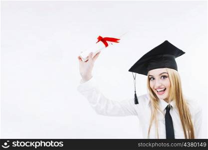 smiling young graduating woman with diploma