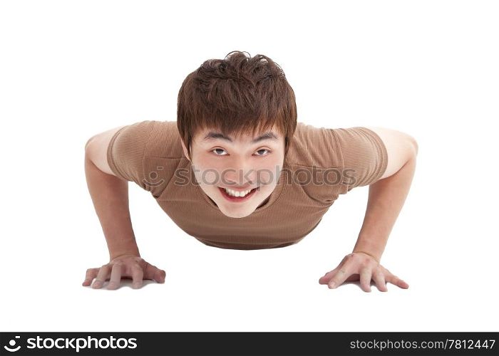 smiling Young man make push-ups and fitness