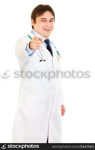 Smiling young medical doctor pointing finger at you isolated on white&#xA;