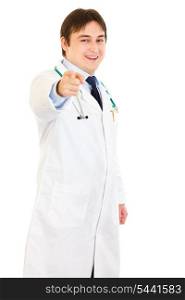 Smiling young medical doctor pointing finger at you isolated on white&#xA;