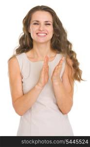 Smiling young woman applauding