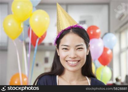 Smiling Young Woman At Office Party