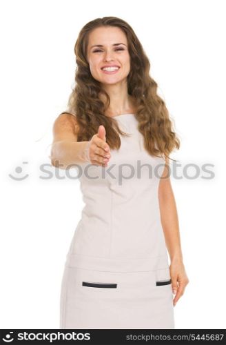 Smiling young woman hstretching hand for handshake