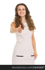 Smiling young woman hstretching hand for handshake