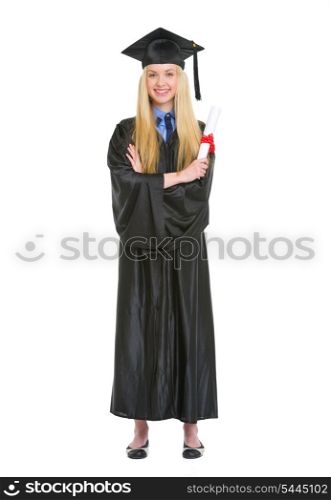 Smiling young woman in graduation gown holding diploma