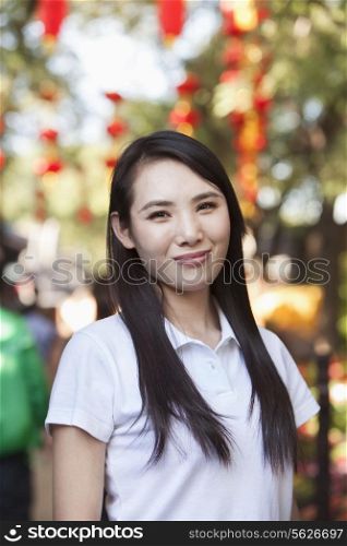Smiling Young Woman In Nanluoguxiang, Beijing
