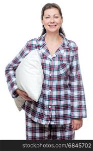 Smiling young woman in pajama with pillow posing on white backgr. Smiling young woman in pajama with pillow posing on white background