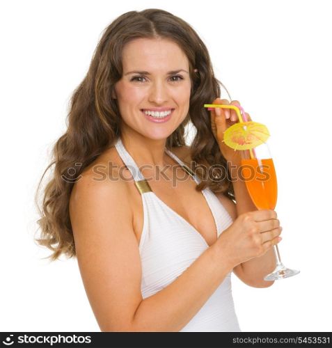 Smiling young woman in swimsuit with cocktail