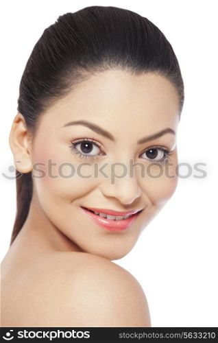 Smiling young woman over white background