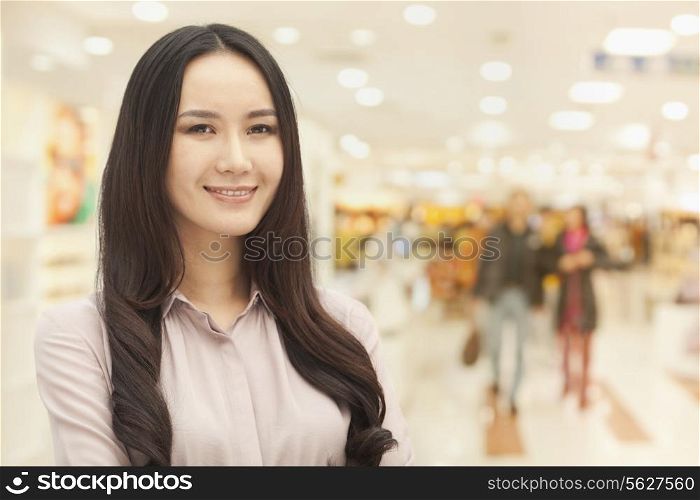 Smiling young woman, portrait