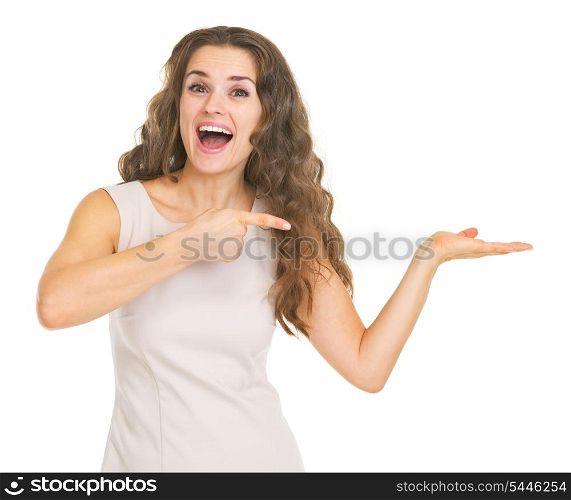 Smiling young woman presenting something on empty palm