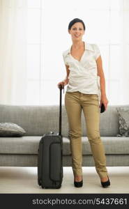 Smiling young woman ready for trip