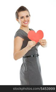 Smiling young woman showing heart shaped postcard