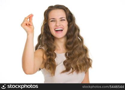 Smiling young woman snapping fingers
