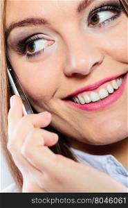 Smiling young woman use phone.. Emotions communication and message technology. Young happy woman talk make a phone call smiling.