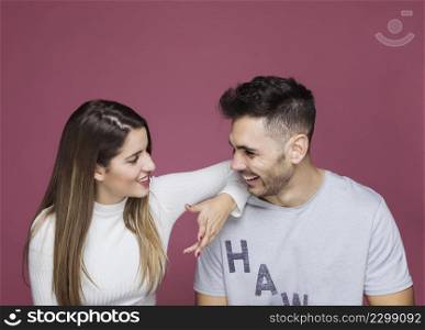 smiling young woman with hand man shoulder