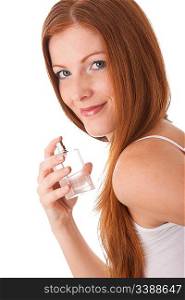 Smiling young woman with perfume on white background