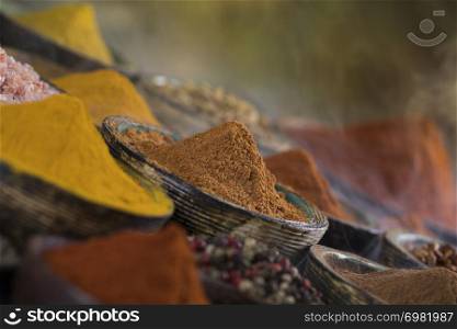 Smoke, Aromatic spices on wooden background