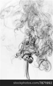 smoke background and texture with puffs and swirls from burning incense sticks