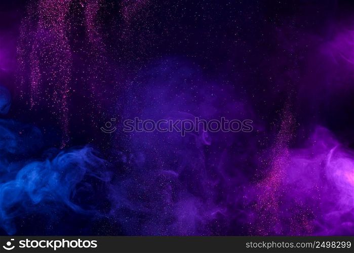 Smoke colorful clouds and shiny glitter bursts. Abstract outer space fairy tale background.