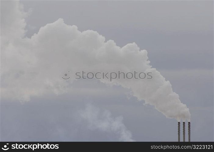 Smoke coming out of a chimney in Alberta Canada