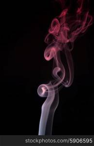 smoke from a cigarette in a black background