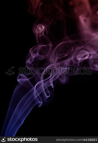 smoke from a cigarrette detail in black background