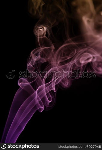 smoke from a cigarrette detail in black background